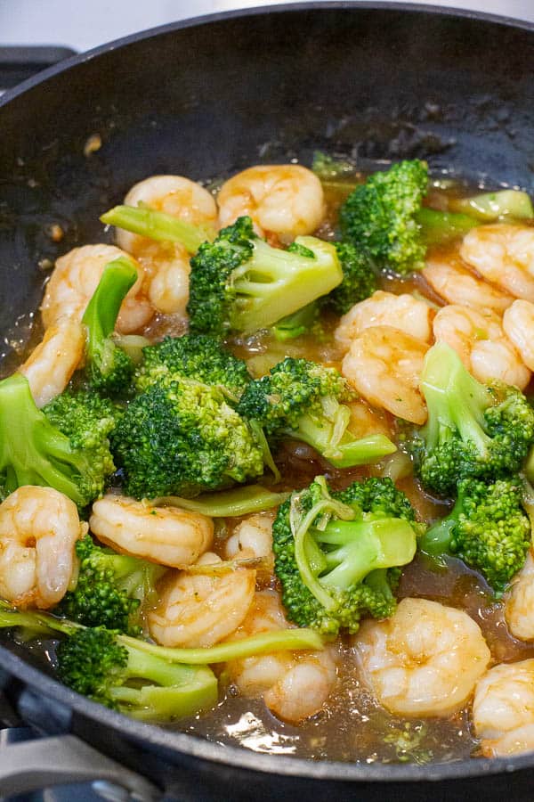Shrimp and broccoli in thick sauce.