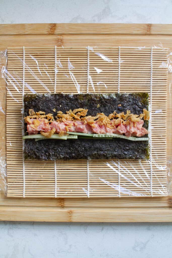 Top view of nori and fillings for uramaki sushi rolls.