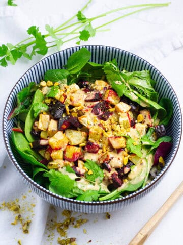 Japanese sweet potato and beetroot salad in a bowl.