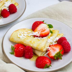 Coconut milk crepe with strawberry topping.