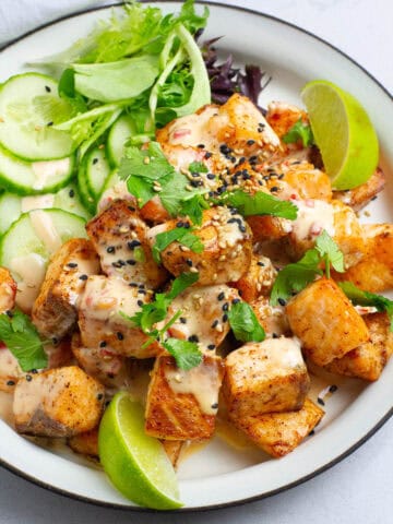 Close up shot of bang bang salmon bites.