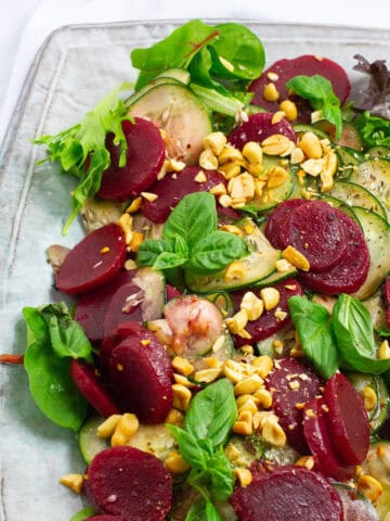 Close up shot of cucumber beetroot salad.