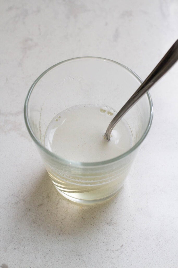 The gelatin powder melted in the water.