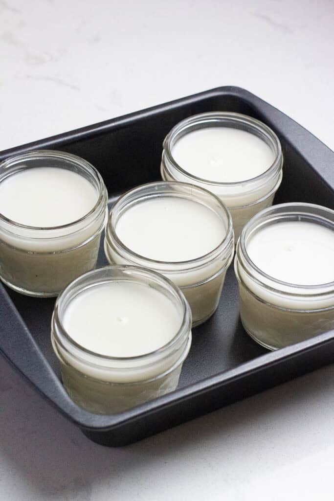 Coconut panna cotta mix in glass cups.