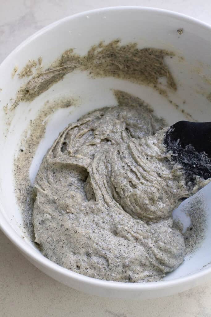 Dough for black sesame cookies in a bowl.