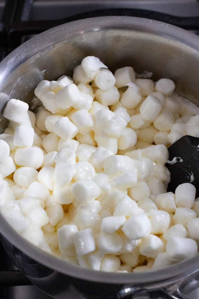 Mini marshmallows in a saucepan.