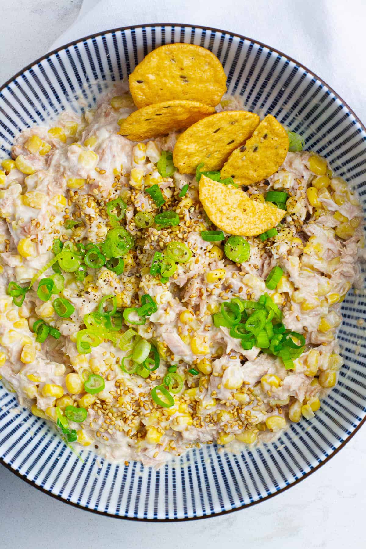 Top view of tuna corn salad in a bowl.