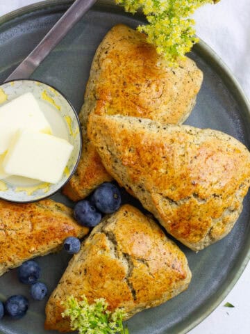 Top view of earl grey scones on a plate.
