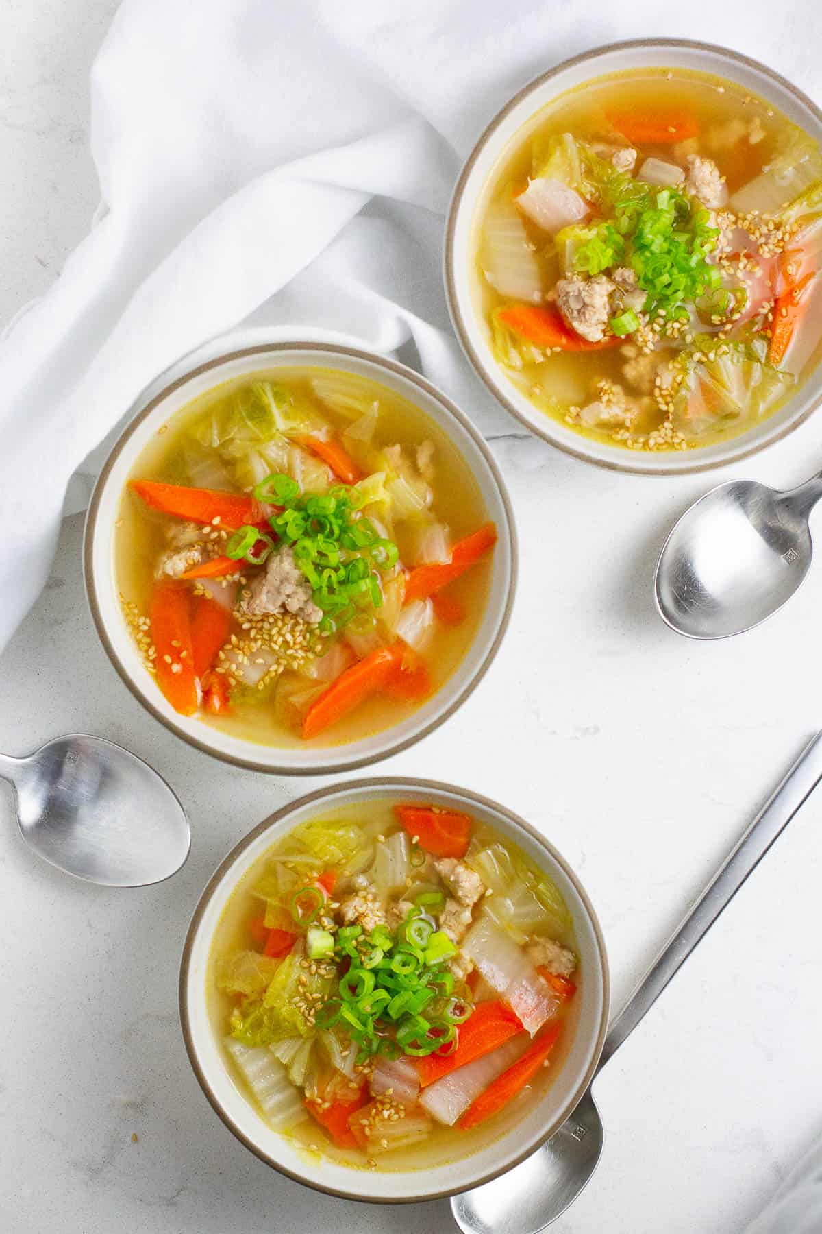 Top view of pork napa cabbage soup.