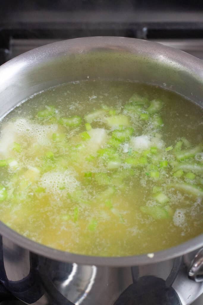 Cod soup in a saucepan.