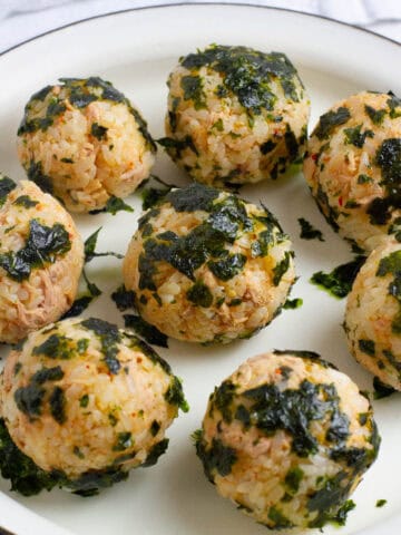 Korean seaweed rice balls on a plate.