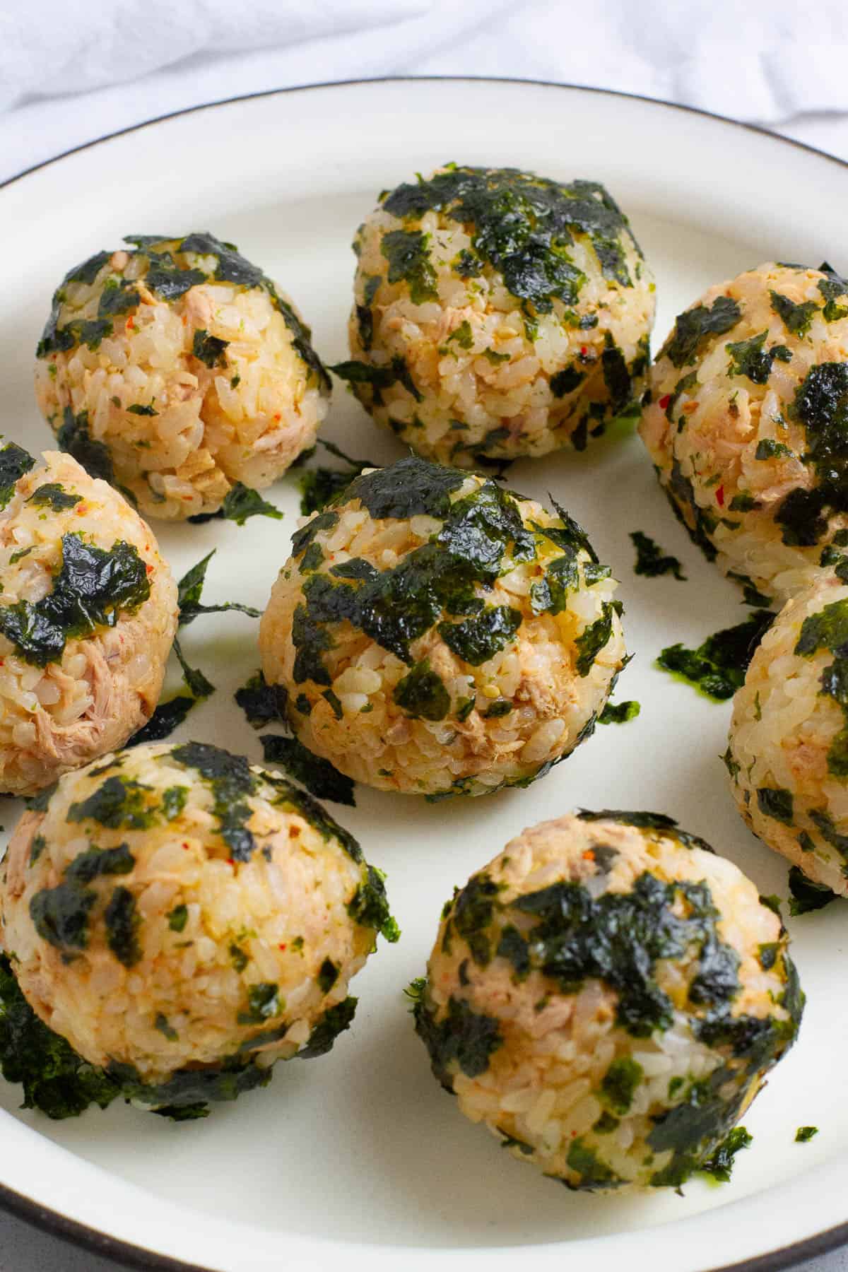 Korean seaweed rice balls on a plate.