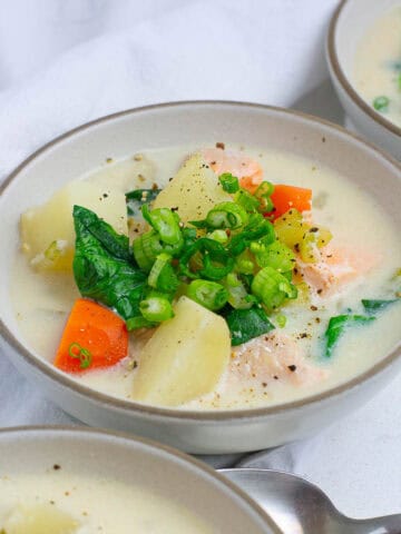Close up shot of creamy salmon soup.