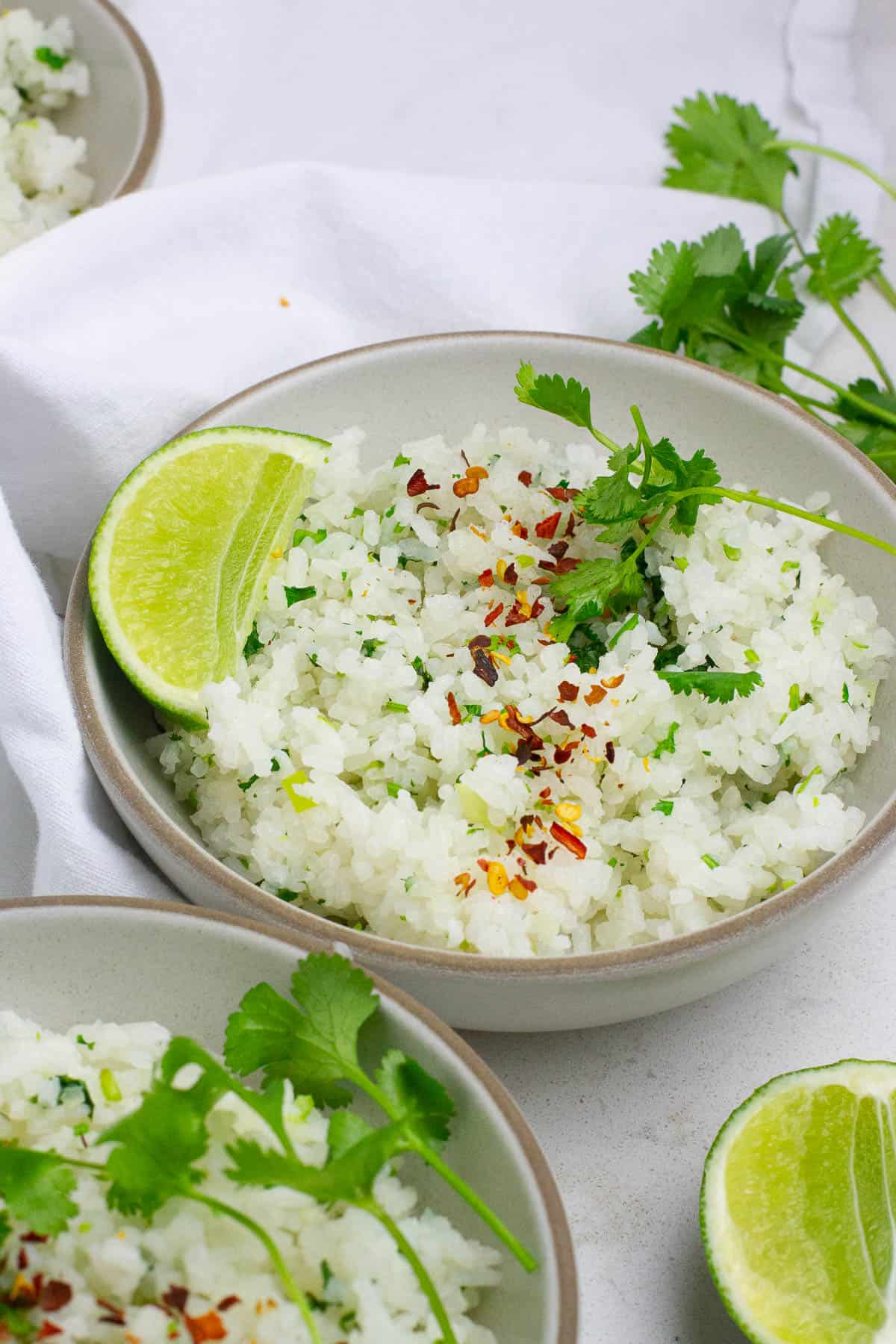 Close up shot of cilantro lime rice in a bowl.