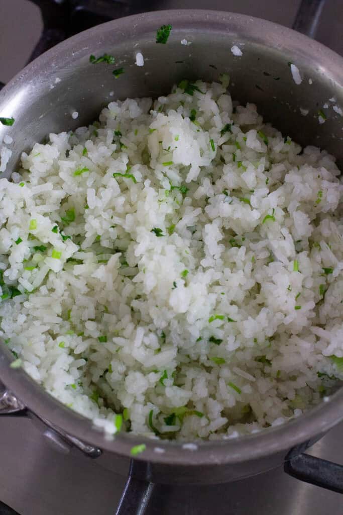 Cilantro lime rice in a saucepan.