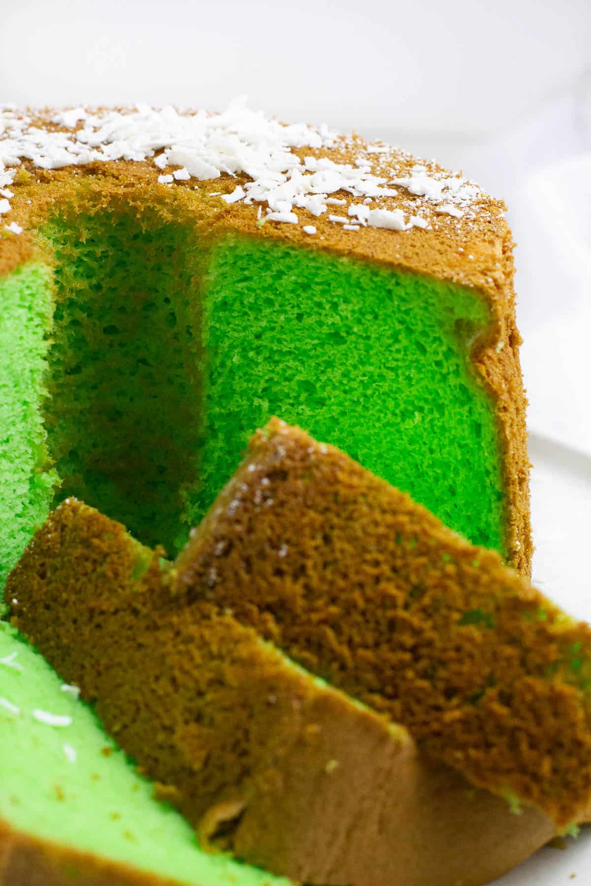 Close up shot of cut side of pandan chiffon cake.
