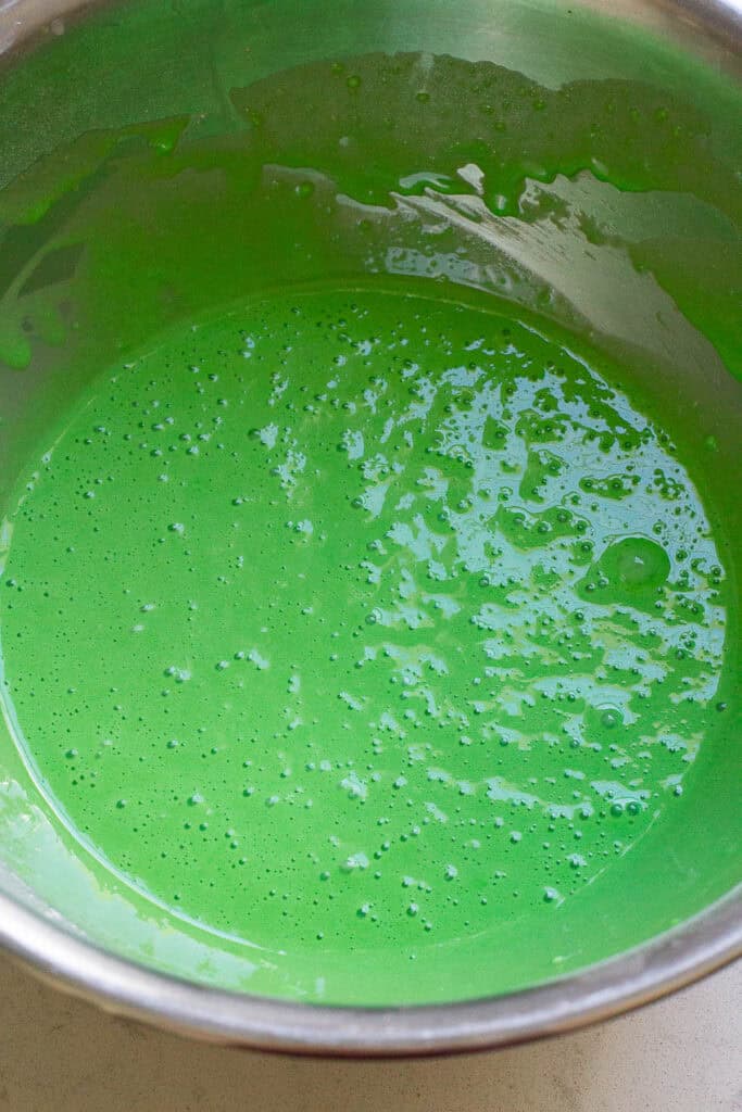 Batter for pandan chiffon cake in a bowl.