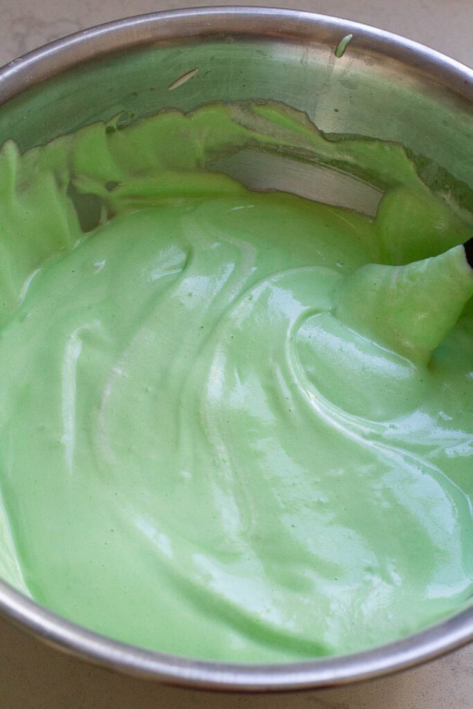 Batter for pandan chiffon cake in a bowl.
