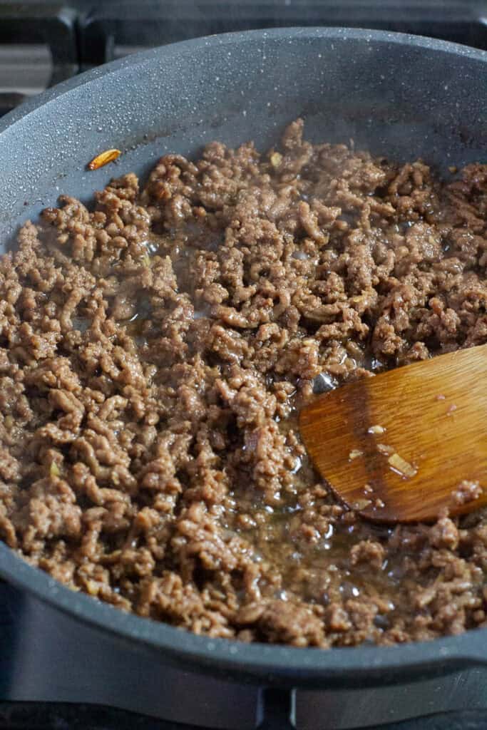 Teriyaki beef topping in a pan.