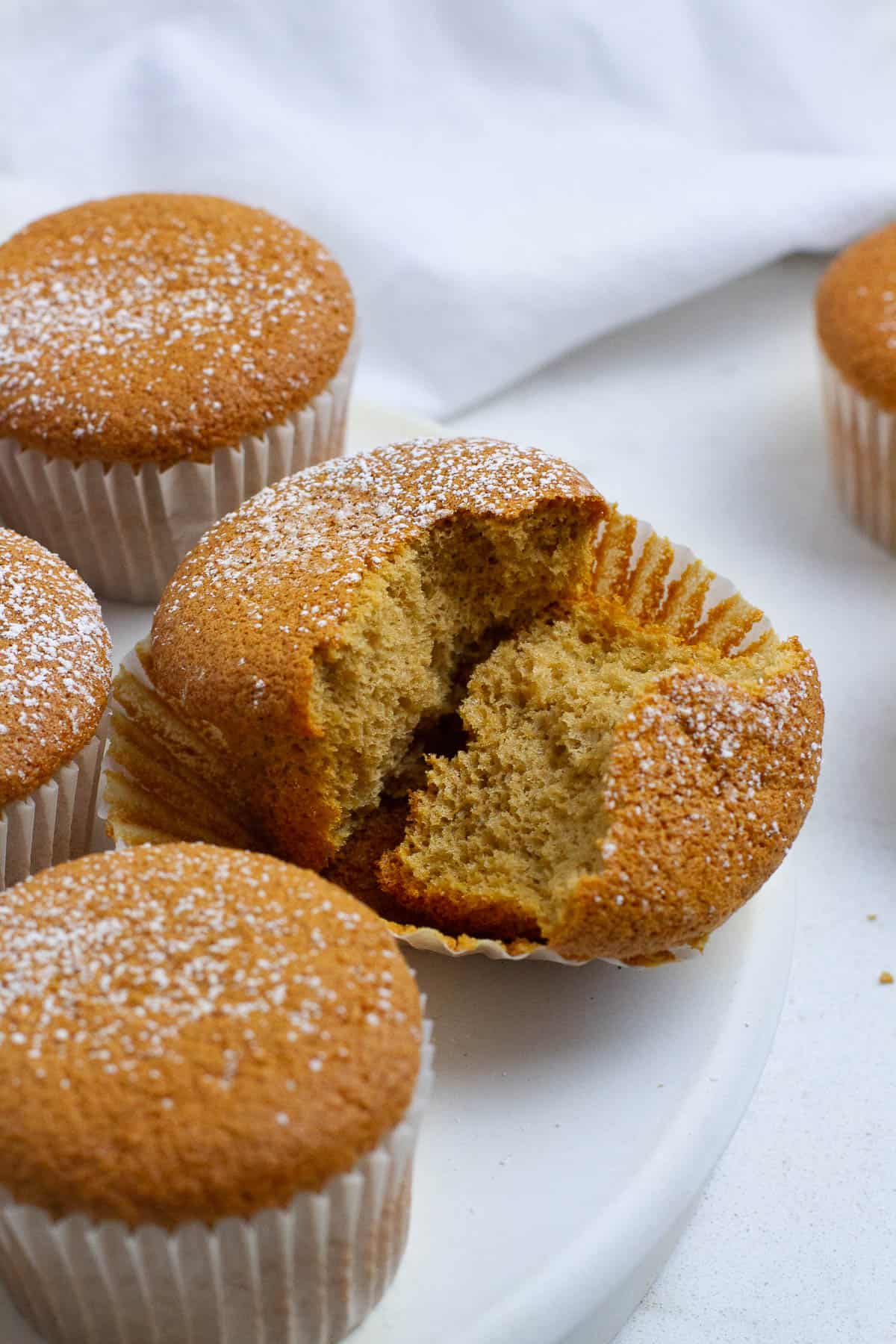 Coffee chiffon cupcake split in half.