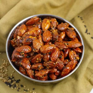 Tamari almonds in a cup.